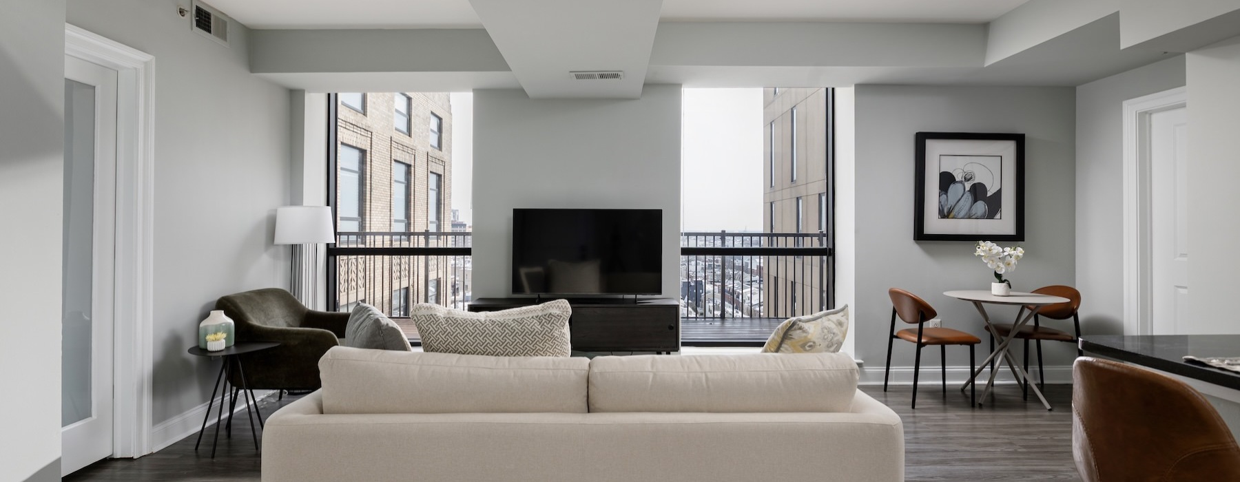 a living room with a couch and a tv