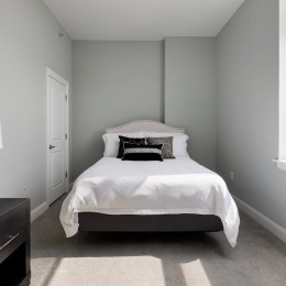 a bedroom with a bed
