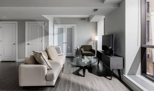a living room with a tv and a couch